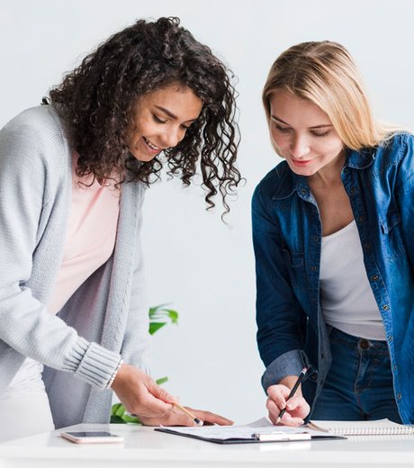 A wellness coach planning next steps with a client